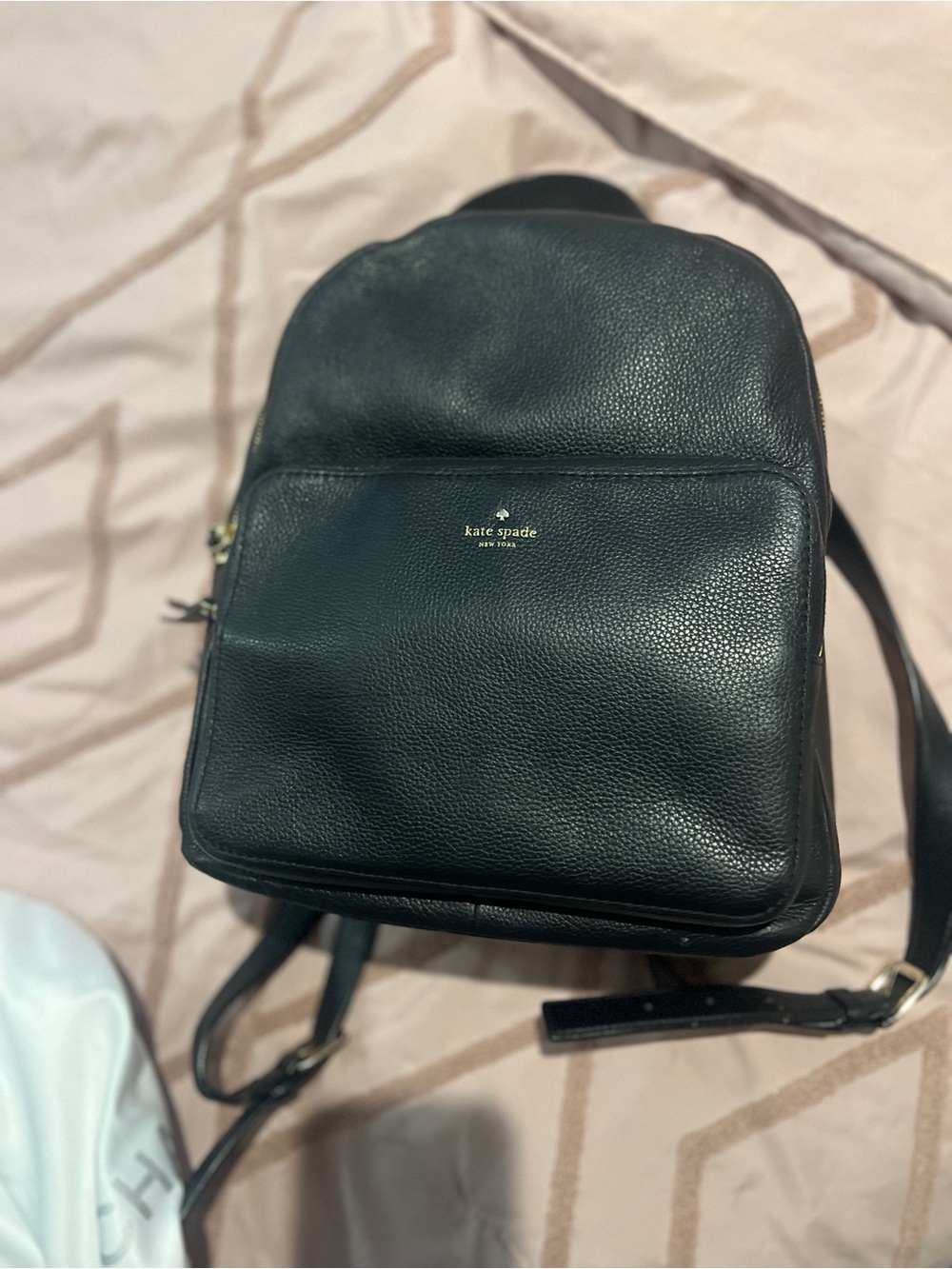 kate spade black pebble leather backpack with gold logo